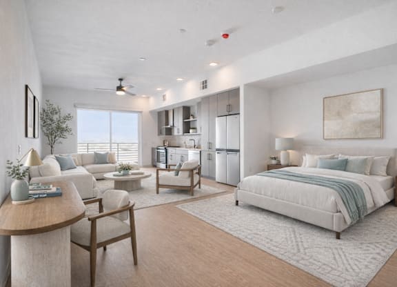 A modern bedroom with a large bed and a ceiling fan.