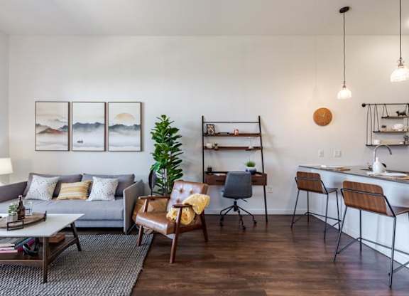 a living room with a couch and a table