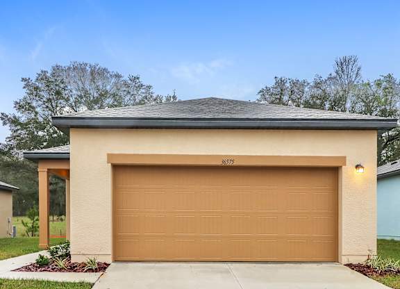 A garage with the number 86572 on it.