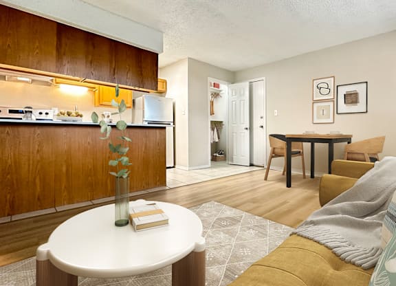Pet-friendly apartment with open living room at Aurora Meadows near Denver CO