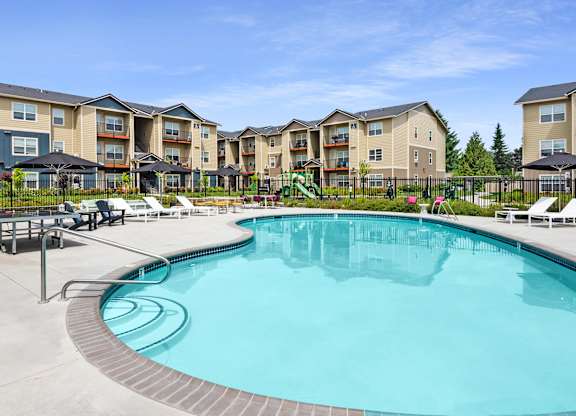 our resort style swimming pool is in front of our apartment buildings