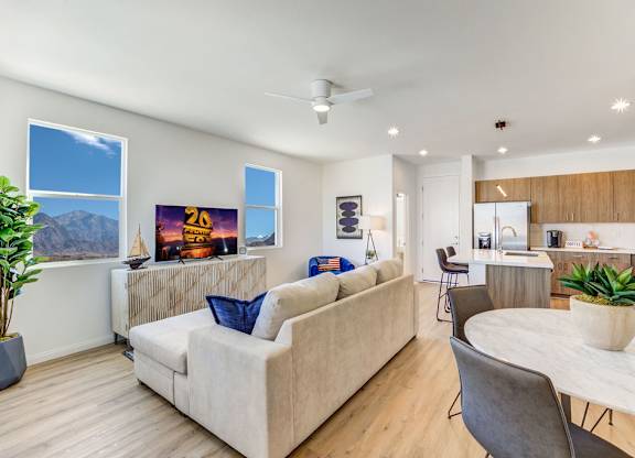 a living room with a couch and a table