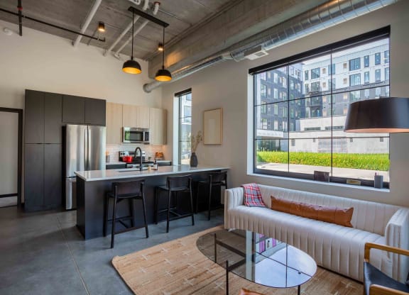 kitchen and living room at the central apartments near downtown minneapolis mn 55408