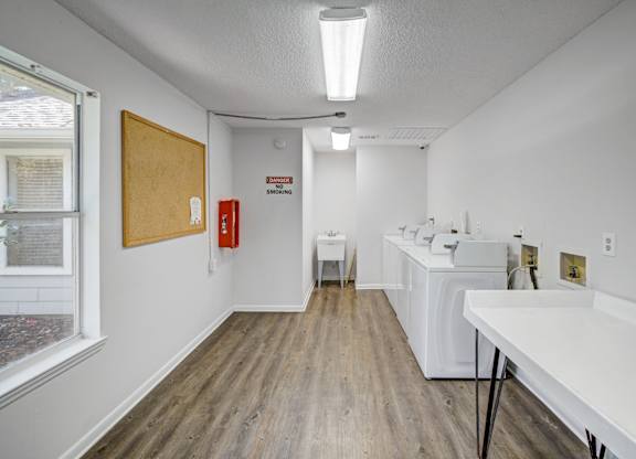 On-site laundry facilities at Chelsea Apartments in Gainesville, Florida
