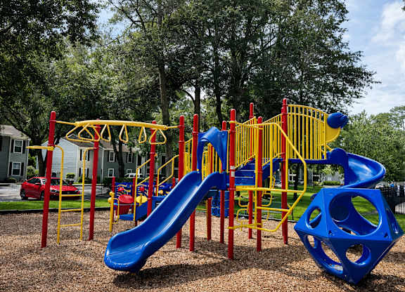 Spacious community playground at Chelsea Apartments in Gainesville, FL