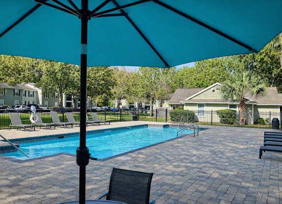 Resort-style swimming pool at Chelsea Apartments in Gainesville, FL
