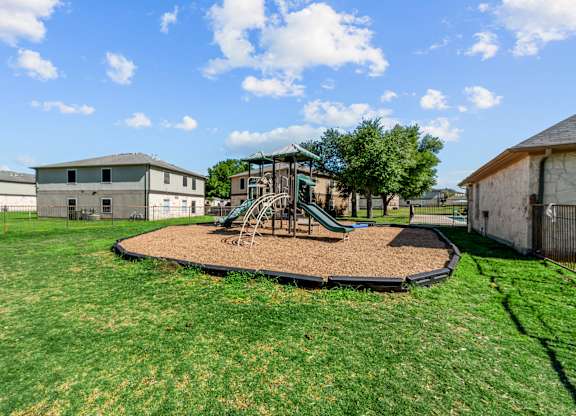 Children’s playground at Huntington Meadows Apartments in Austin, TX 78724, providing family-friendly outdoor spaces for residents near East Austin.