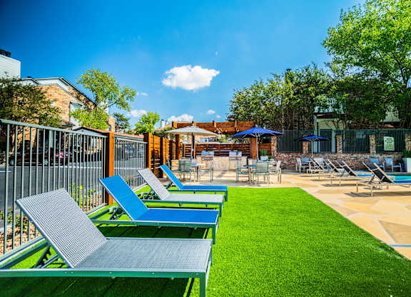 cottages at wells branch  poolside lounge chairs