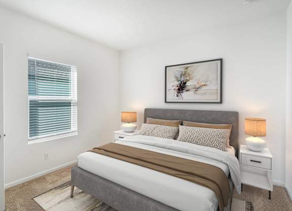 A bedroom with a bed, nightstands, and a painting on the wall.