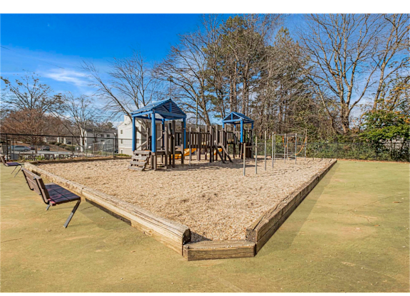 Community playground at Springdale Glen, a pet-friendly apartment community in Clarkston, GA, near Decatur