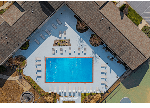 Resort-inspired pool with sundeck at Springdale Glen, a pet-friendly community in Clarkston, GA, near Decatur.