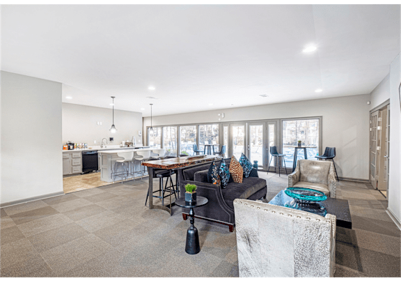 Clubroom with comfortable seating and modern décor at Springdale Glen, a pet-friendly community in Clarkston, GA, near Decatur.