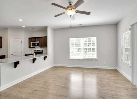 Harris Trail Luxury Townhomes for rent Richmond Hill, GA photo of living room with large window