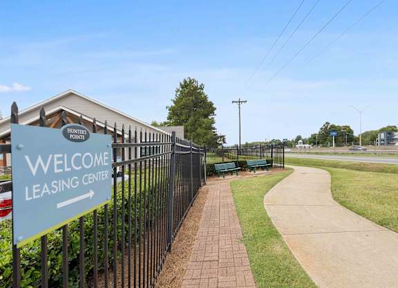 Sidewalk path within the community at Hunters Pointe apartments in Charlotte, NC 28213, near UNC Charlotte.