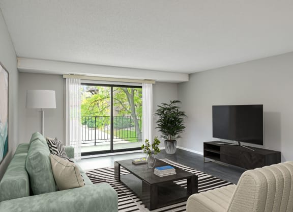 Laurel West End Apartments in Golden Valley, MN photo of a living room with a large window and a sliding glass door