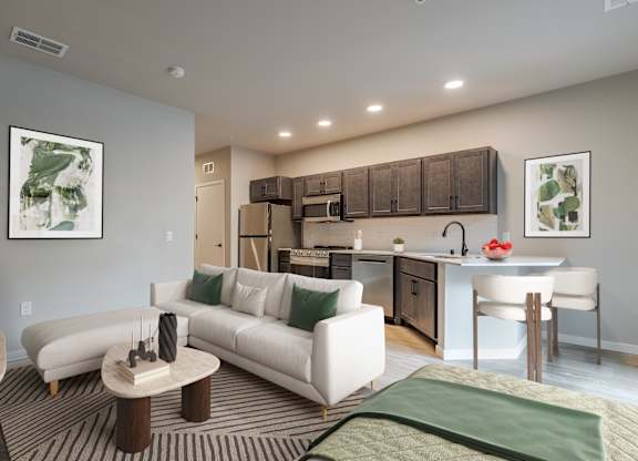 A modern living room with a white sofa and a coffee table.