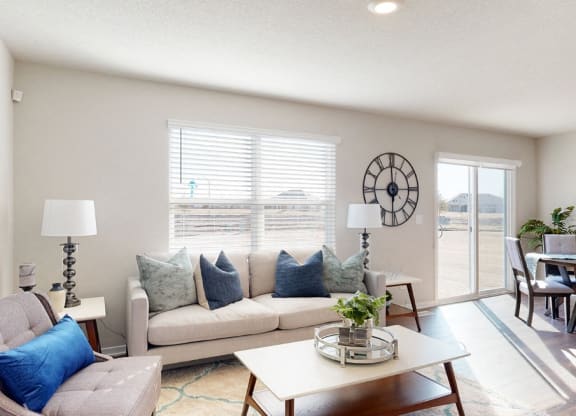 a living room with a couch and a table