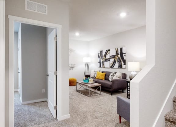 our apartments offer a living room with stairs to the