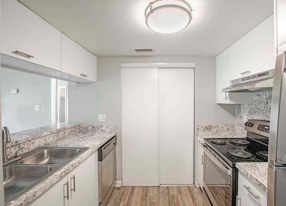 Pet-Friendly Apartments in Kissimmee, FL- Mirador at Woodside - Gourmet Kitchen with Pantry and Cabinet Space