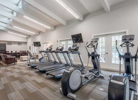 Pet-Friendly Rentals in Sevierville, TN – Overlook at Allensville – A gym with treadmills, elliptical machines, and a television.