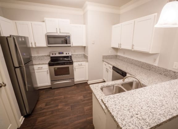 The Asher at Sugarloaf apartments in Lawrenceville Georgia photo of upgraded kitchen