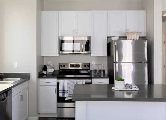 Modern kitchen with stainless steel appliances in North Las Vegas rental home