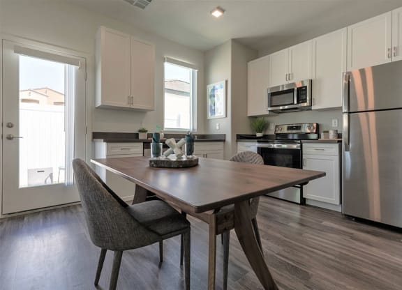 Open-concept dining and kitchen in North Las Vegas home for rent