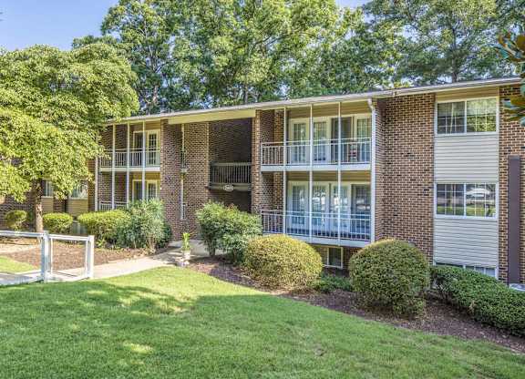 Front view of apartment building at Grand Arbor Reserve Apartments in Raleigh, NC 27607, near Central Raleigh.