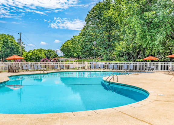 Resort-style swimming pool at Grand Arbor Reserve Apartments in Raleigh, NC 27607, near Central Raleigh