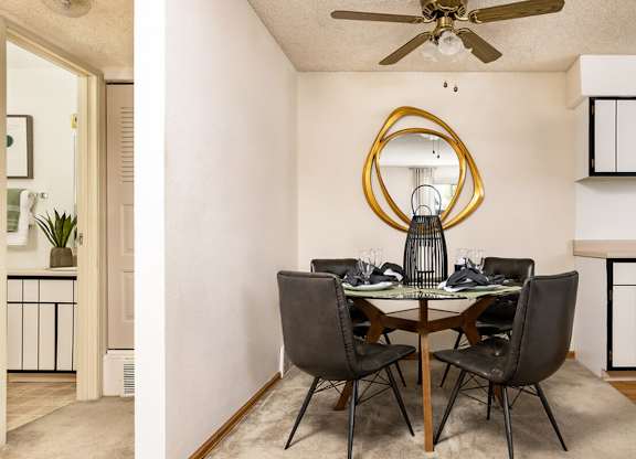 Dining space inside a classic apartment at Trailgrove Apartments near the Denver Tech Center.