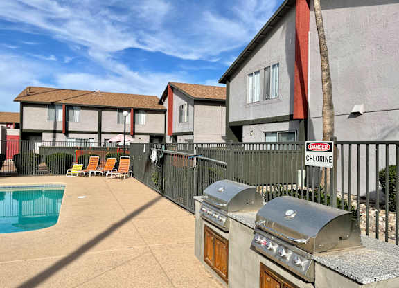 Outdoor grilling stations at Midtown on Seneca, a pet-friendly apartment community near East Central Tucson, Tucson, AZ.