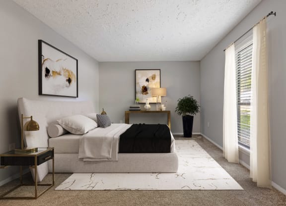 Reserve at Providence Apartment in Charlotte NC photo of bedroom with large window and plush carpeting