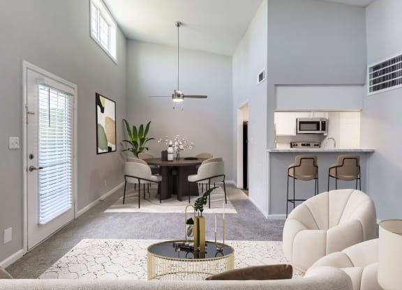 Reserve at Providence Apartment in Charlotte NC photo of a living room with a dining room and kitchen in the background