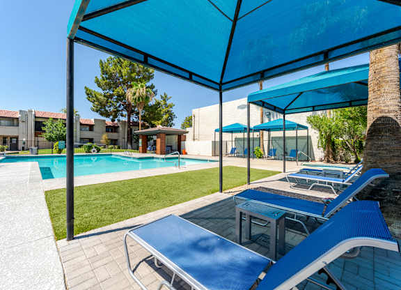 Covered poolside gathering area at Sono Tempe, a pet-friendly apartment community in Tempe, AZ.