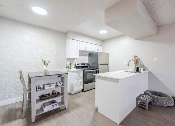 Modern apartment kitchen at Sono Tempe in Tempe, AZ featuring updated appliances and clean finishes.
