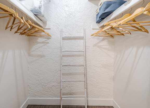 Spacious closet with built-in shelving inside a Sono Tempe apartment in Tempe, Arizona.