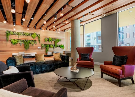a room filled with furniture and a large window