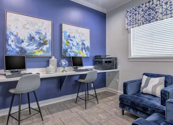 Fully equipped business center with workstations and high-speed internet at Grande Club apartments in Duluth, GA 30096, near Lawrenceville.