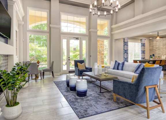 Modern resident clubhouse featuring comfortable seating and community spaces at Grande Club apartments in Duluth, GA 30096, near Lawrenceville.