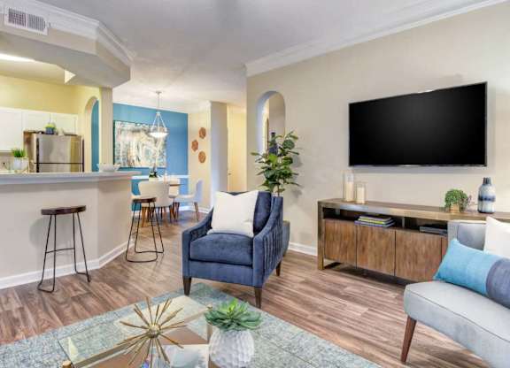 Open-concept living room with modern design at Grande Club apartments in Duluth, GA 30096, near Lawrenceville.