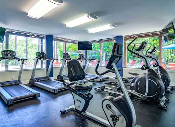 Fully equipped on-site fitness center featuring treadmills, ellipticals, strength machines, and free weights—offering Marietta renters a convenient alternative to a gym membership.