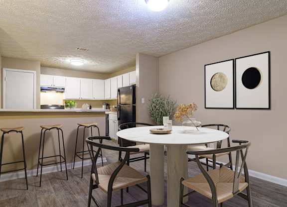 Spacious Dining room adjacent to the kitchen at Stratford Ridge, a pet-friendly community in Marietta, GA, near Smyrna