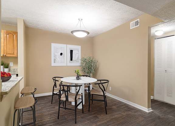 Bright and spacious dining room at Stratford Ridge Apartments in Marietta, GA, ideal for family meals and social gatherings.