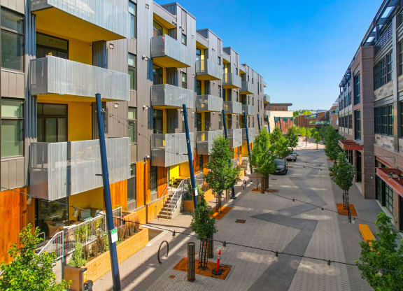 a view of a street in front of a building