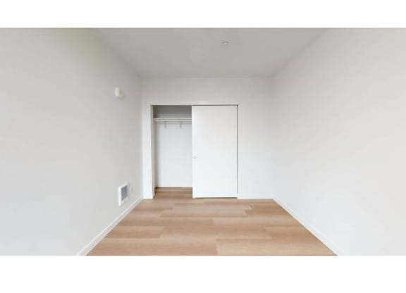 Bedroom with sliding closet door