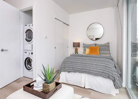 Bedroom and washer and dryer