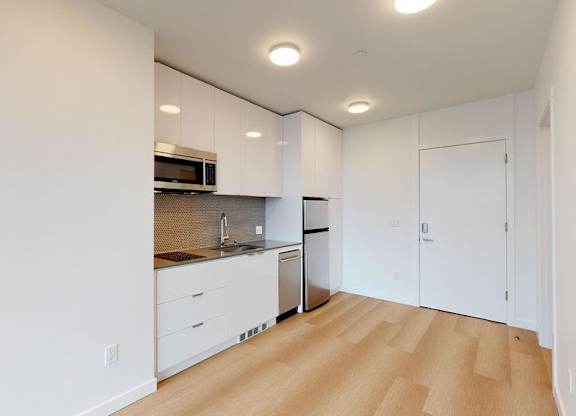 Kitchen with wood-style flooring