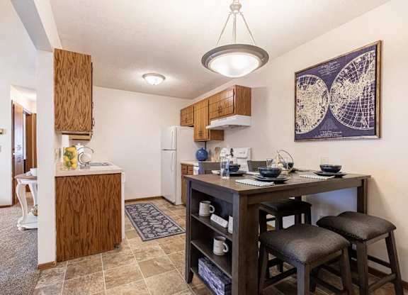 Kitchen and dining area in Uppertown Apartments