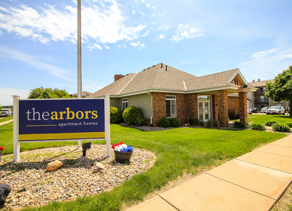 a house with a sign in front of it