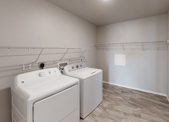 A laundry room with a washer and dryer.